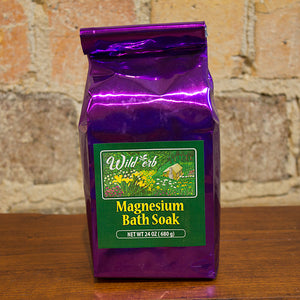 Picture of a purple bag with Magnesium Bath Soak inside